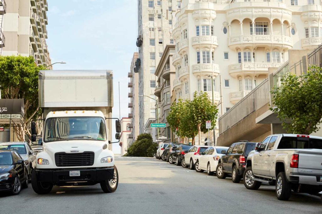 A front view of a moving truck parked in San Francisco, CA.